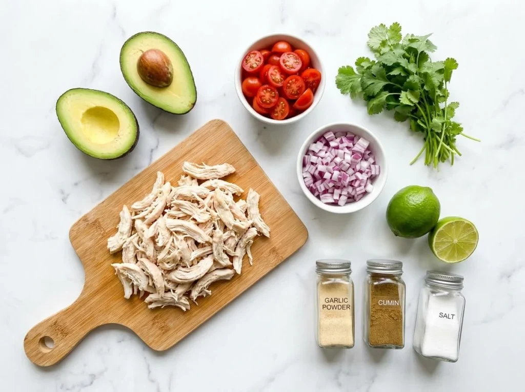 Creamy Avocado Chicken Salad - No Mayo, Done in 15 Minutes! 2 All ingredients for healthy avocado chicken salad on white marble counter